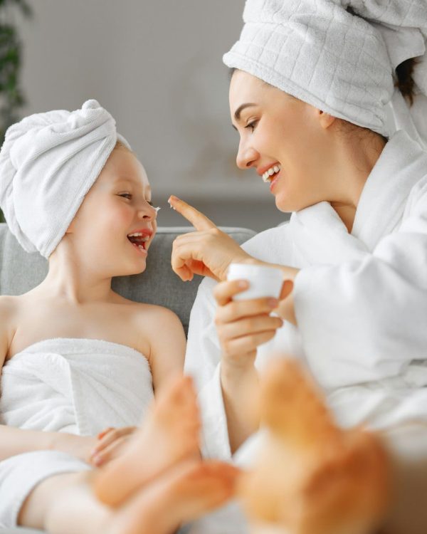 Mother and daughter after a bath